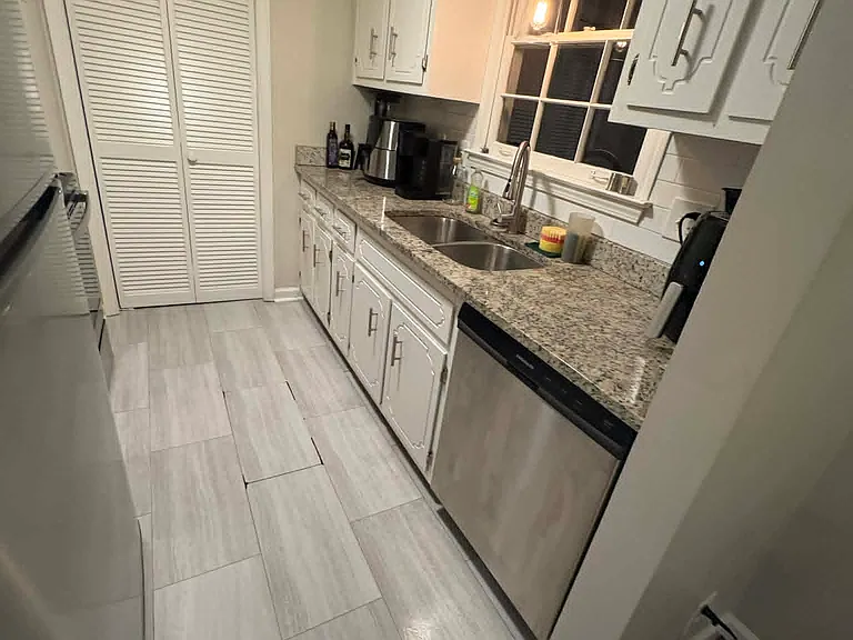 Granite countertops and stainless steel appliance