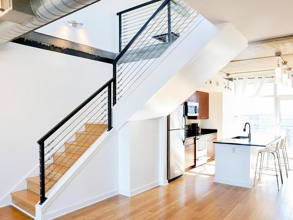 Stairway to Loft and Kitchen Area