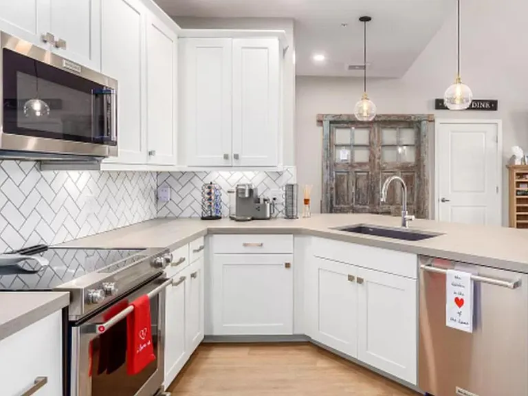 Beautiful upgraded kitchen with Kitchen Aid appliances and high end cabinets.