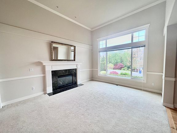 Living room with huge window , 14ft tall ceilings