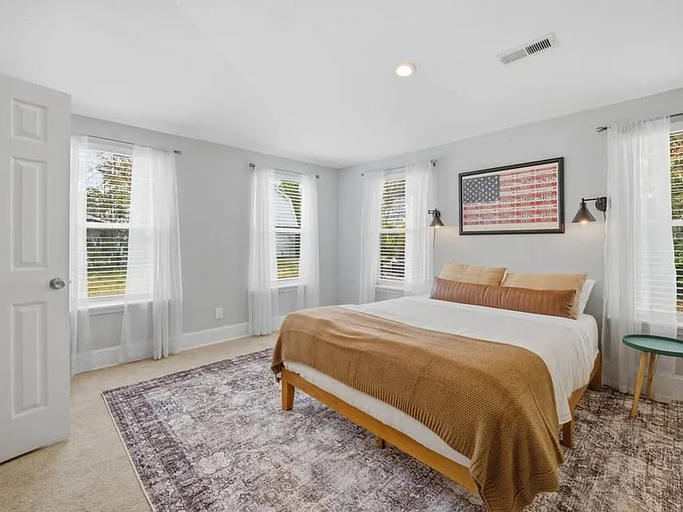 Room 1: Primary bedroom with Queen size bed. Very spacious with walk-in closet and en suite bathroom.