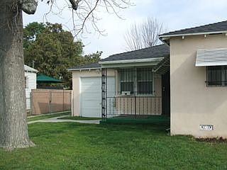 Front showing attached garage