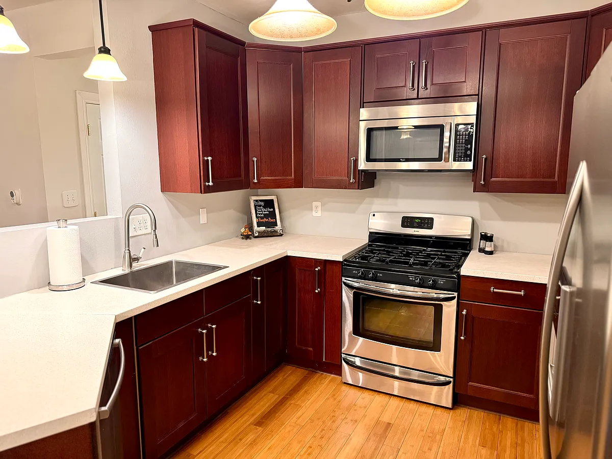Dishwasher on lower left, Gas Stove, microwave and fridge - 103 N Center St #1