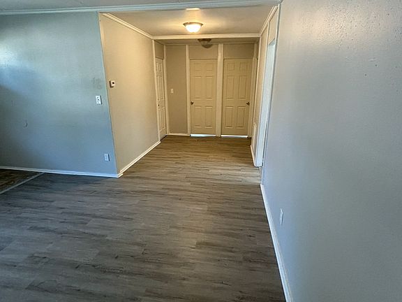 looking at bedroom doors from living room