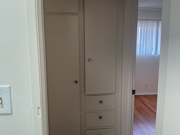 Hall storage closets and drawers