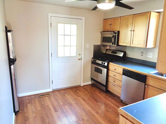 kitchen & back door to patio and fenced in yard