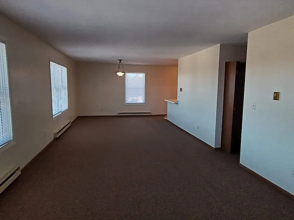 Living and dining room is 12 x 32. This view faces east. End closest to kitchen is designed for a table.