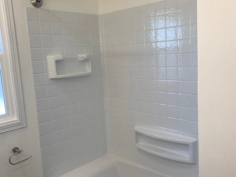 Brand new shower and bathtub