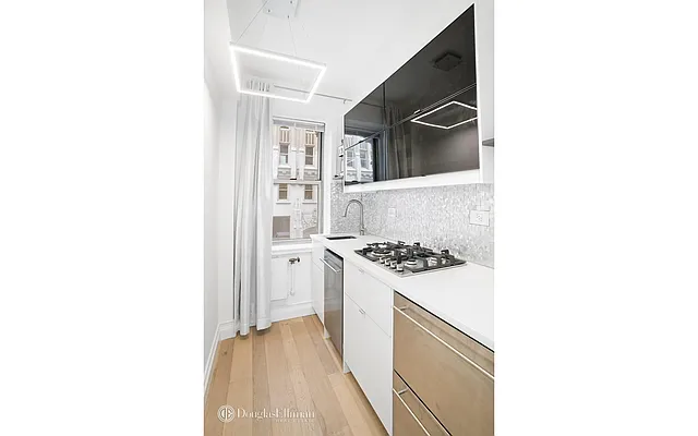 Sold by Douglas Elliman | media 11