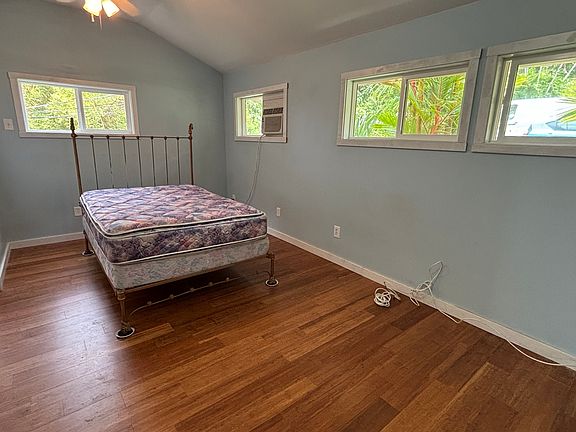 Large rennovated airy bedrooms with lots of winndows and large closet! New luxury laminate floors.