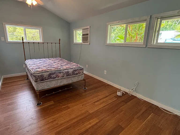 Large rennovated airy bedrooms with lots of winndows and large closet! New luxury laminate floors.