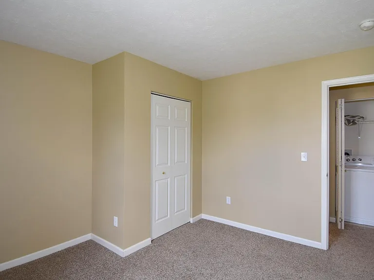 The third bedroom has a attached closet
