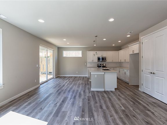 Photos are of the Huntington plan at Holley Brooke Lot 16, and may depict enhancements and/or upgrades that are not available with every plan.
