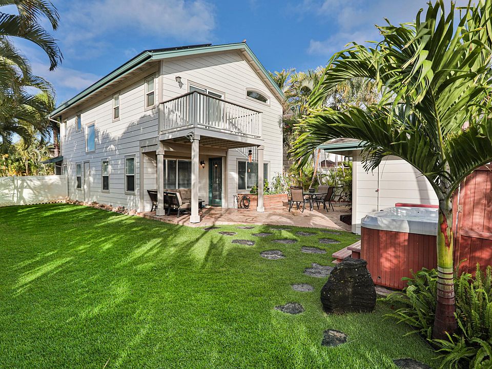 Backyard and jacuzzi (landscaping services provided)