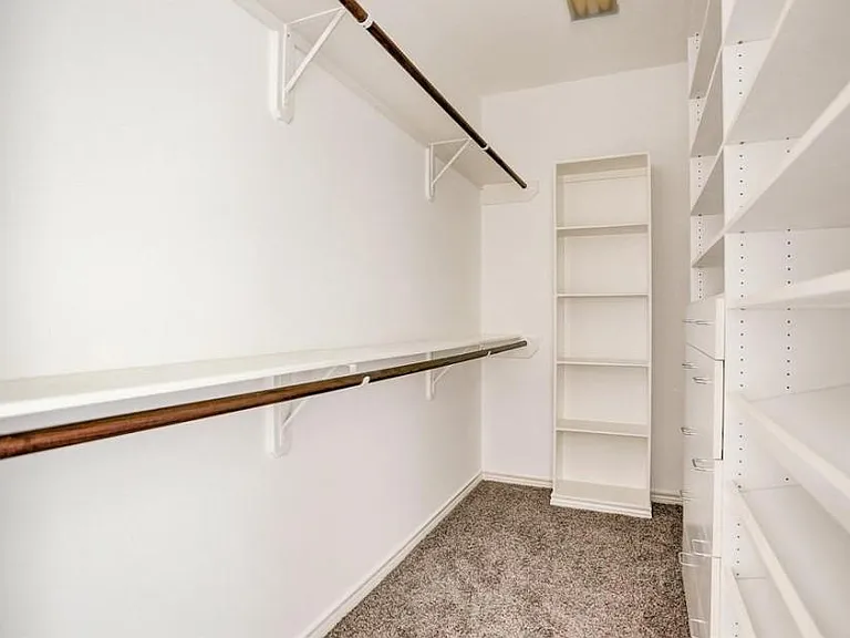 Second closet in the master has a built in shoe rack!