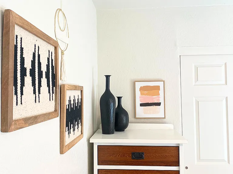 Bedroom 3: Full size bed with a stylish dresser & a spacious closet with a hamper & hangers for your convenience.