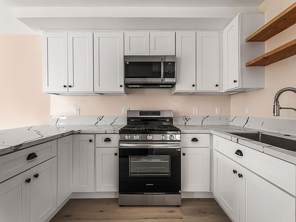 open concept kitchen with plenty of storage