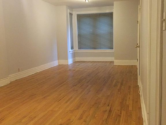 Living area back to front w/o furniture.
