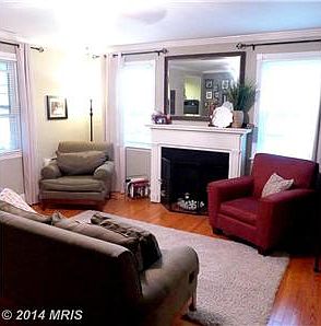Living Room w/Wood Burning Fireplace