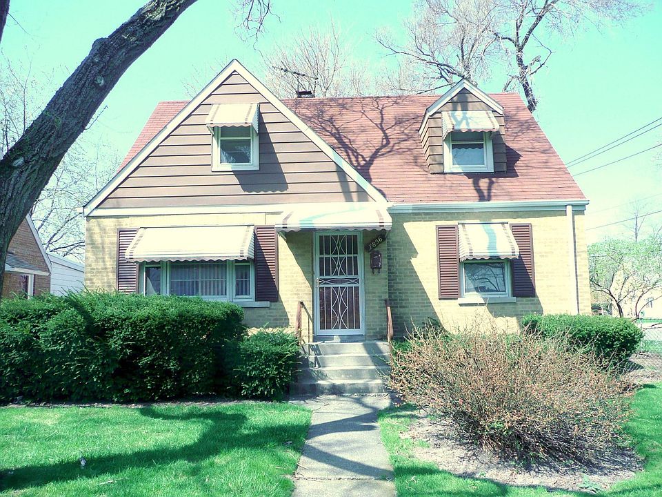 Gorgeous cape cod brick home