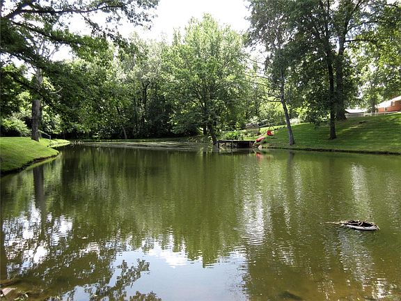 Large stocked pond and dock