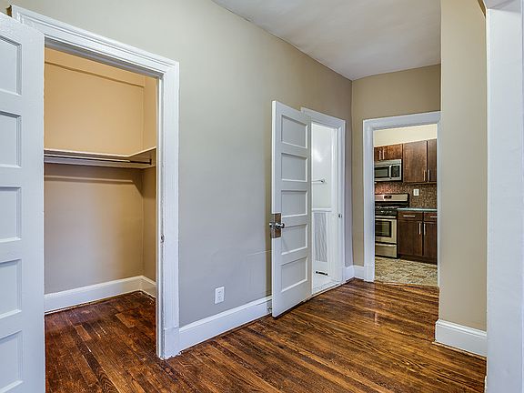 Two-bedroom apartment living to kitchen area