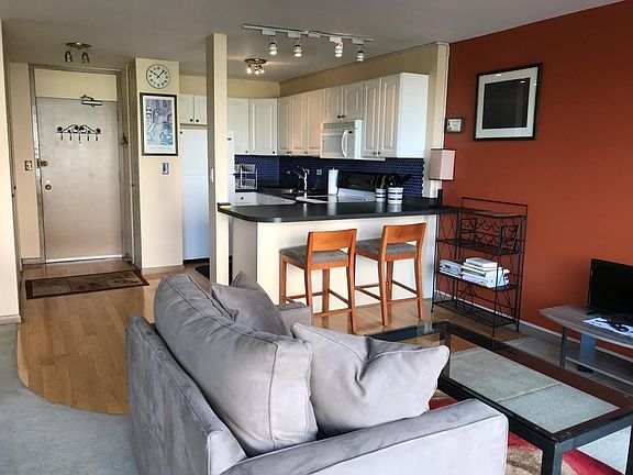 View toward entry and kitchen