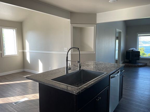 Kitchen island with dishwasher.