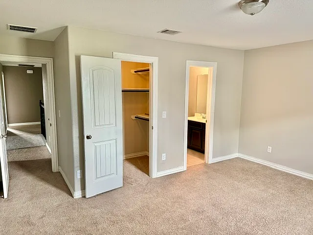 Bedroom 4 walk-in closet & private bath w/shower