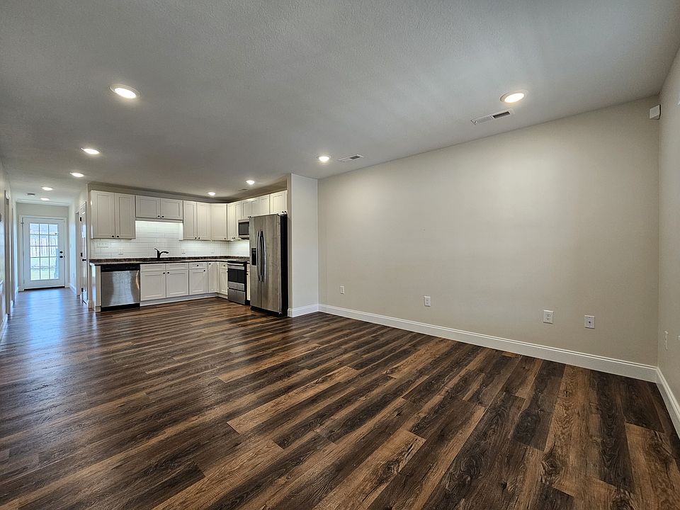 Open living room looking into the kitchen
*May be a photo of a similar unit