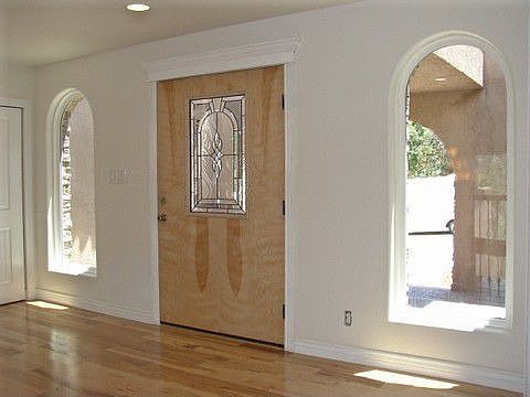 Beautiful hardwood floors & custom door in entry