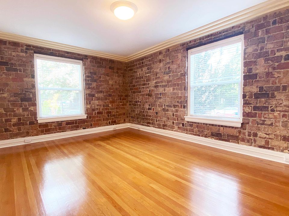 Exposed Brick Walls, Ultra Low-E Insulated Windows