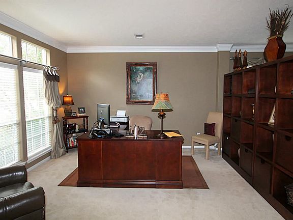 FORMAL LIVING ROOM, CURRENTLY BEING USED AS A STUDY, COMPLETE WITH CROWN MOLDING