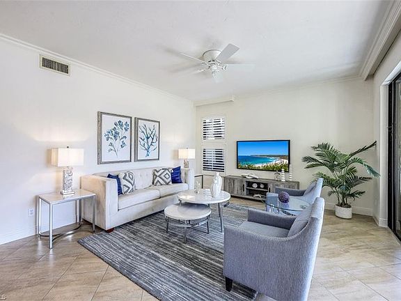 2nd image of 7056 Pelican Bay Blvd #105