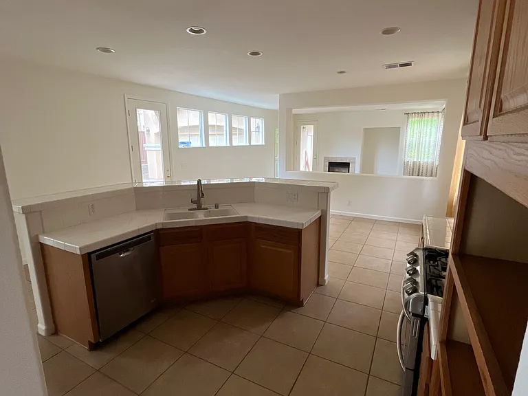 View of kitchen from butler's pantry between kitchen and dining room
