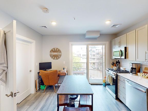 A Scandinavian Penthouse Apartment with Slanted Ceilings - Scandinavian Apartment Penthouse With In Unit Laundry