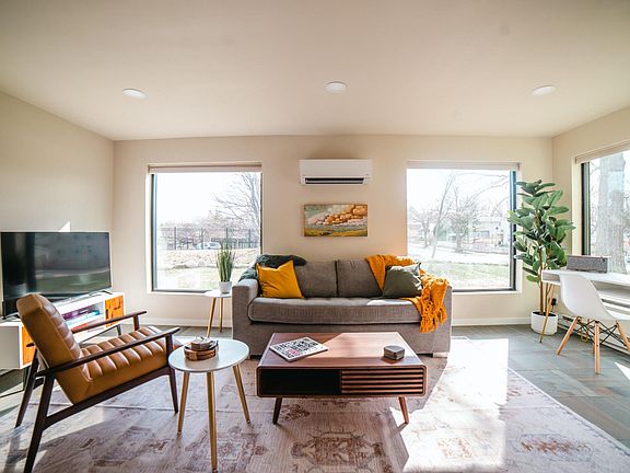 Large open concept living space with home office.