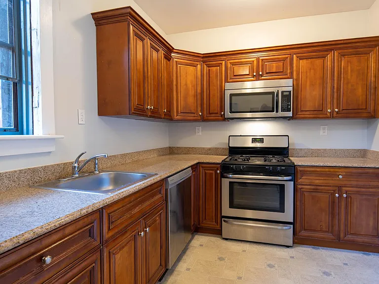 Kitchen, featuring granite countertops and stainless steel appliances