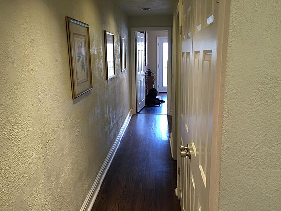 Hallway to the second bedroom and second bathroom