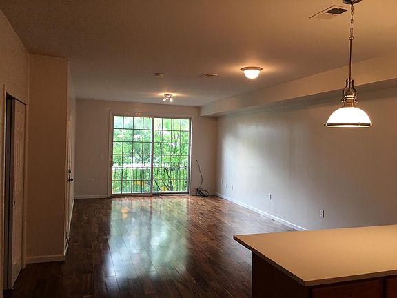 Living room with a French doors and Juliet balcony