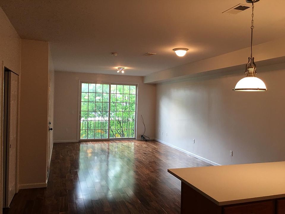 Living room with a French doors and Juliet balcony