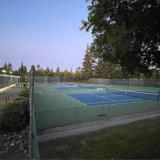 Free use of boats, gas grills, and tennis rackets and balls. Six tennis courts.