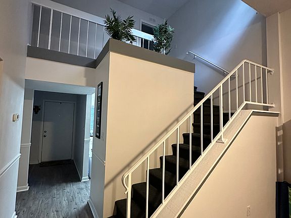 View of staircase from living room.