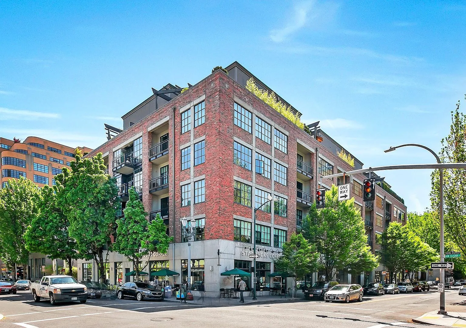McKenzie Lofts - 2nd floor south facing Pearl District studio w/parking/storage/covered balcony — Photo 1