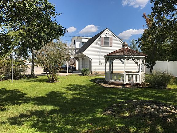 Side yard with gazebo.