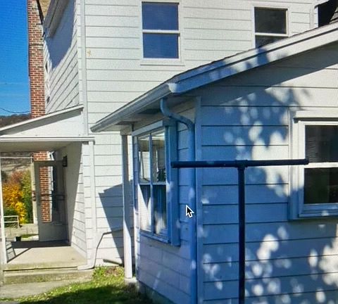 side porch. laundry and mud room.