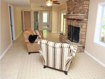 Real wood fireplace, walk out to back patio, right off the Bar / wine celler