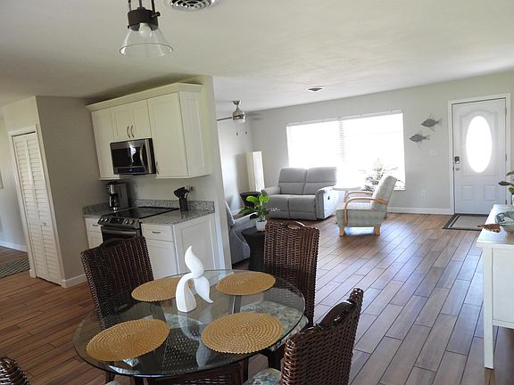Dining room looking to front of the house and living room.