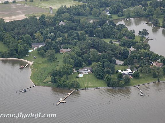 Aerial view of property and dock