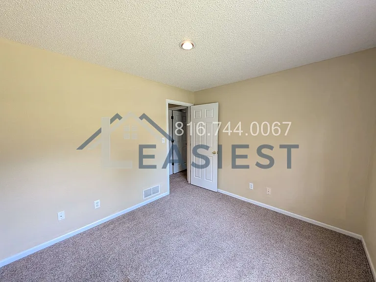 1855 NE Knollbrook St — Photo 18